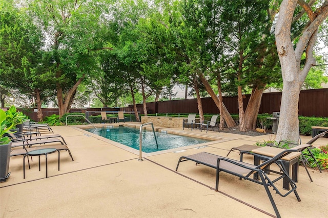 4605 Cedar Springs Rd Unit 201, Dallas, TX 75219 - community pool featuring a fenced backyard and a patio