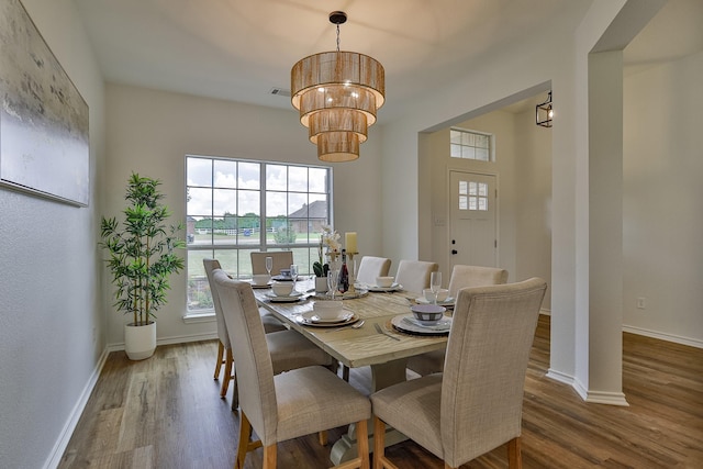 13725 Hickory Creek Dr, Haslet, TX 76052 - dining area featuring wood finished floors, baseboards, and a chandelier