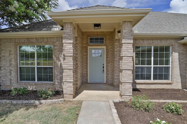 13725 Hickory Creek Dr, Haslet, TX 76052 - entrance to property with roof with shingles and brick siding