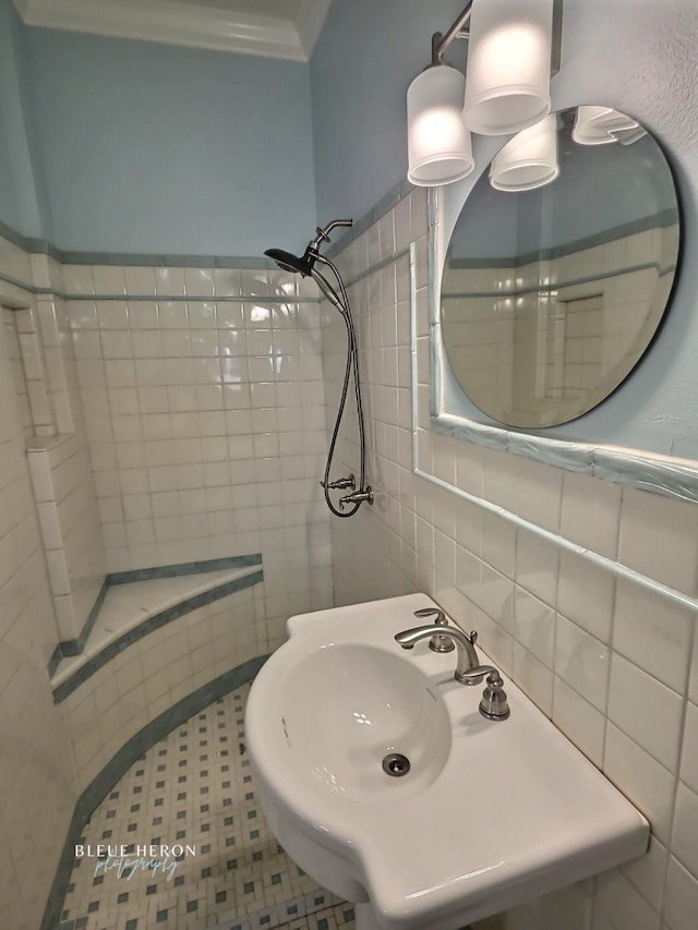 129 Ardmore Ave, Shreveport, LA 71105 - bathroom with tile walls, ornamental molding, and a sink
