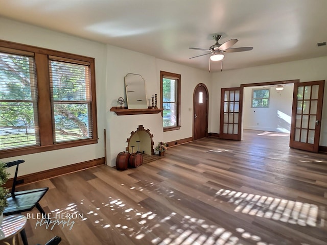 129 Ardmore Ave, Shreveport, LA 71105 - entrance foyer with healthy amount of natural light, baseboards, french doors, and wood finished floors