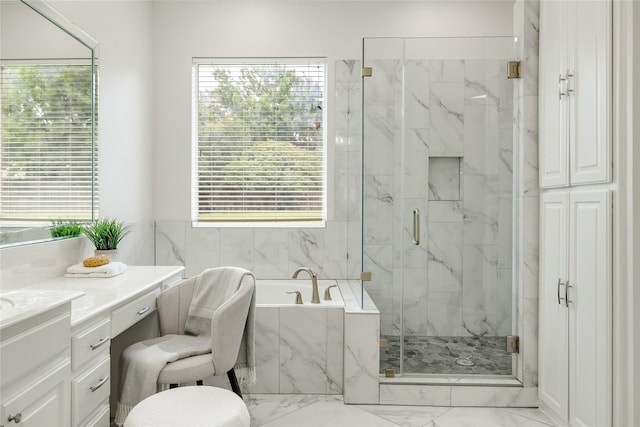 6408 Riverside Dr, Plano, TX 75024 - full bath with marble look tile flooring, a bath, a marble finish shower, and healthy amount of natural light