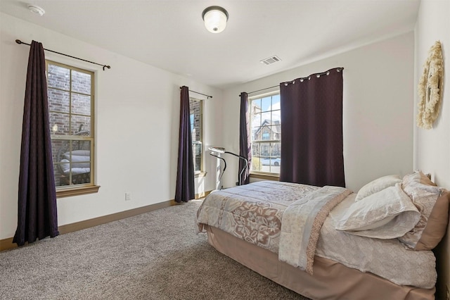 13818 Mammoth Cave Ln, Frisco, TX 75035 - carpeted bedroom featuring baseboards