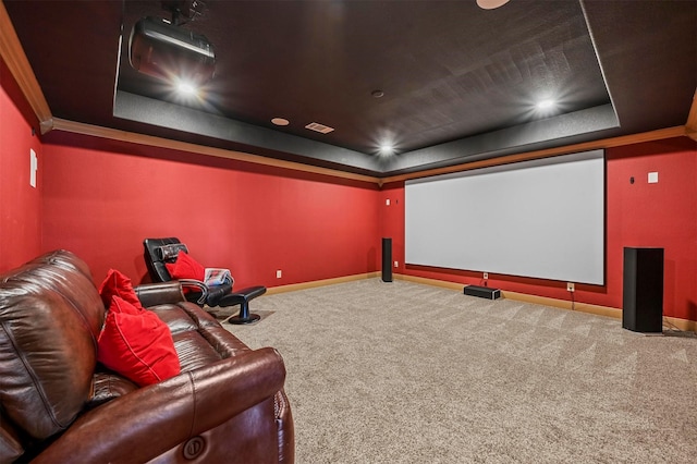 13818 Mammoth Cave Ln, Frisco, TX 75035 - home theater room featuring a tray ceiling, carpet flooring, baseboards, and crown molding