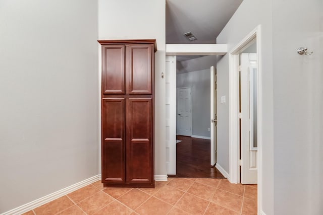 851 Carolina Way, Lantana, TX 76226 - corridor featuring light tile patterned floors and baseboards