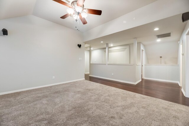 851 Carolina Way, Lantana, TX 76226 - empty room with dark carpet, lofted ceiling, ceiling fan, baseboards, and recessed lighting
