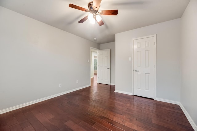 851 Carolina Way, Lantana, TX 76226 - unfurnished bedroom featuring baseboards, dark wood-type flooring, and ceiling fan
