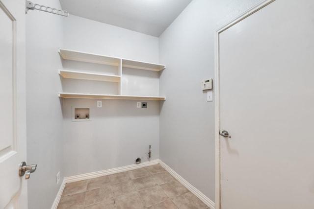 851 Carolina Way, Lantana, TX 76226 - washroom with electric dryer hookup, hookup for a washing machine, gas dryer hookup, baseboards, and light tile patterned floors