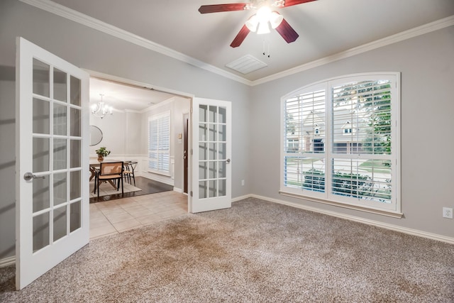 851 Carolina Way, Lantana, TX 76226 - tiled empty room featuring french doors, carpet, crown molding, a chandelier, and ceiling fan