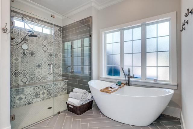 11240 Rosser Rd, Dallas, TX 75229 - full bathroom with a freestanding bath, a shower stall, and ornamental molding