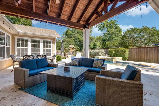 11240 Rosser Rd, Dallas, TX 75229 - fenced backyard with an in-ground hot tub, a patio area, and outdoor lounge area