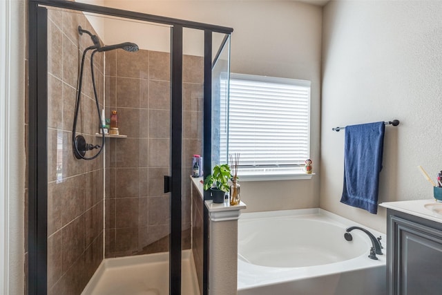 4806 Ashbury Ln, Mansfield, TX 76063 - full bath with vanity, a garden tub, and a shower stall