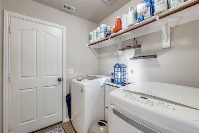 4806 Ashbury Ln, Mansfield, TX 76063 - washroom with independent washer and dryer and light tile patterned flooring