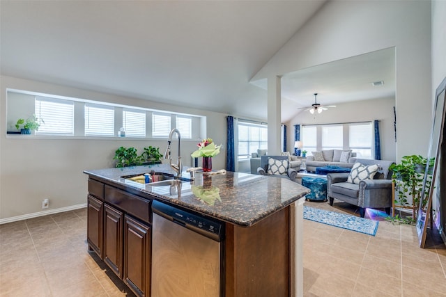 4806 Ashbury Ln, Mansfield, TX 76063 - kitchen featuring dishwasher, a sink, vaulted ceiling, dark stone counters, and light tile patterned floors