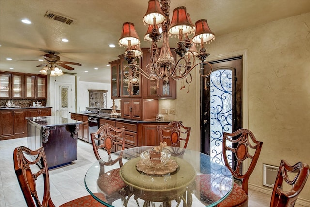 4009 Scenic Way, Granbury, TX 76049 - dining space featuring recessed lighting, a textured wall, ceiling fan, a chandelier, and light tile patterned floors