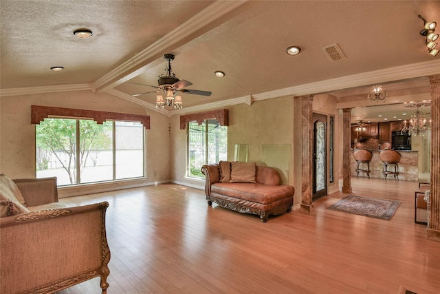 4009 Scenic Way, Granbury, TX 76049 - living area with wood finished floors, ceiling fan, a textured ceiling, crown molding, and baseboards