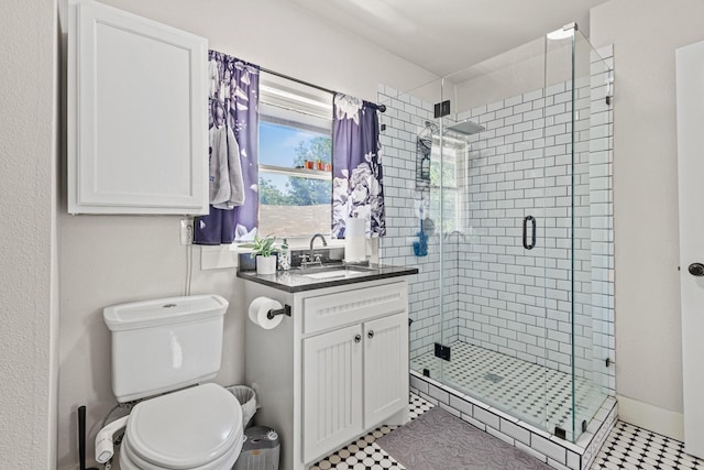2236 Alston Ave, Fort Worth, TX 76110 - full bathroom featuring a shower stall, vanity, and toilet
