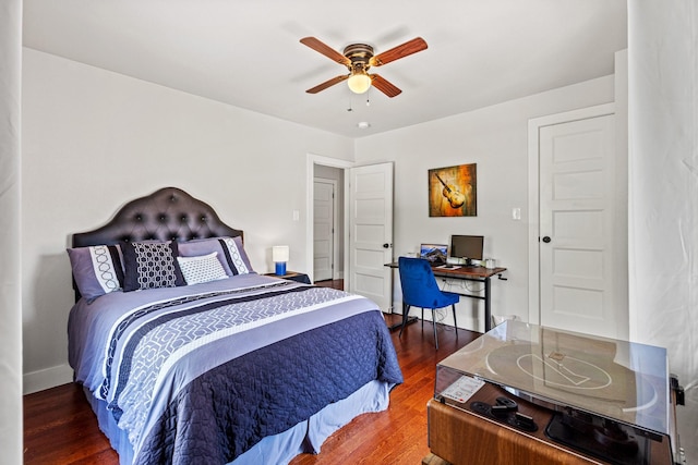 2236 Alston Ave, Fort Worth, TX 76110 - bedroom featuring wood finished floors, a ceiling fan, baseboards, and an office area