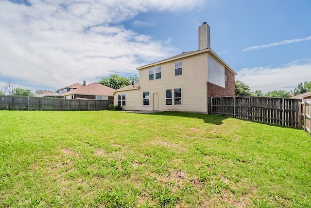 1010 Hanover Dr, Forney, TX 75126 - rear view of house featuring a chimney