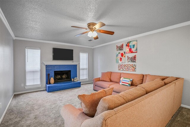 7333 Mesa Verde Trl, Fort Worth, TX 76137 - carpeted living area with ceiling fan, baseboards, crown molding, a textured ceiling, and a brick fireplace