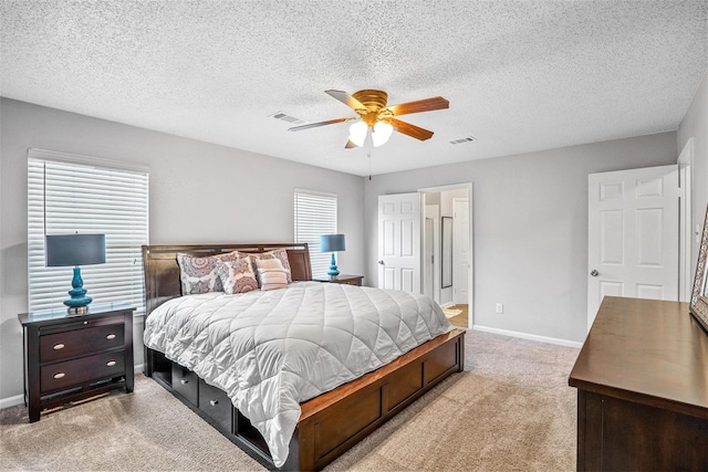 7333 Mesa Verde Trl, Fort Worth, TX 76137 - bedroom with light carpet, baseboards, ceiling fan, and a textured ceiling