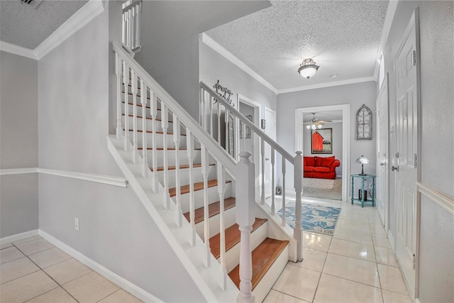 7333 Mesa Verde Trl, Fort Worth, TX 76137 - staircase featuring a textured ceiling, ceiling fan, tile patterned flooring, crown molding, and baseboards
