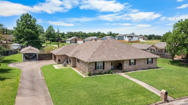 203 Marianne, Sulphur Springs, TX 75482 - ranch-style house featuring roof with shingles, a detached carport, a residential view, brick siding, and asphalt driveway