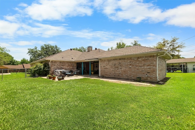 203 Marianne, Sulphur Springs, TX 75482 - rear view of property with a patio and brick siding
