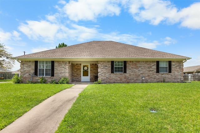 203 Marianne, Sulphur Springs, TX 75482 - view of front of property with brick siding and roof with shingles