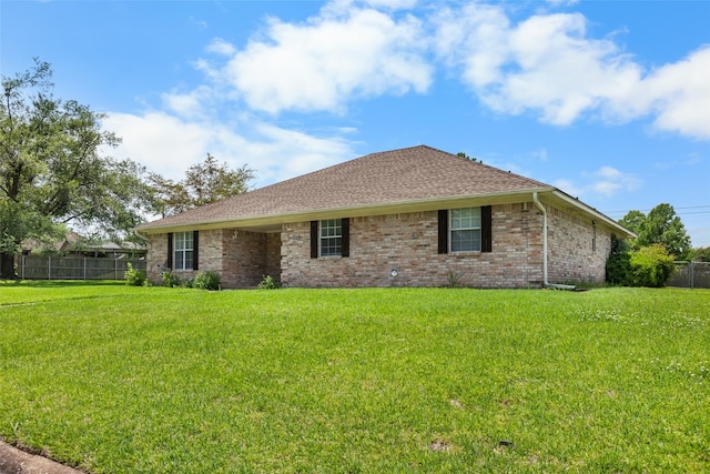 203 Marianne, Sulphur Springs, TX 75482 - rear view of property with brick siding and a shingled roof