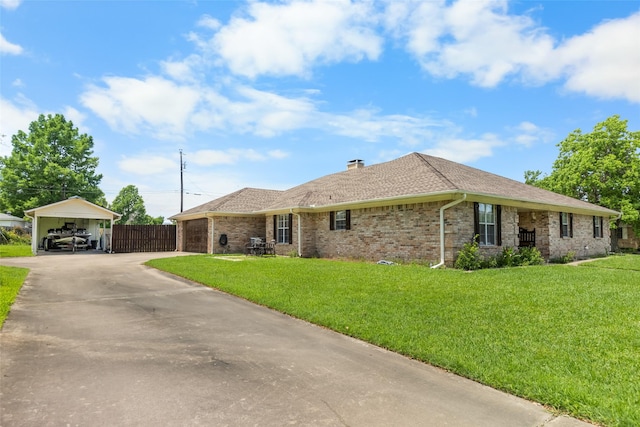 203 Marianne, Sulphur Springs, TX 75482 - ranch-style home with concrete driveway, a chimney, an attached garage, brick siding, and a detached carport