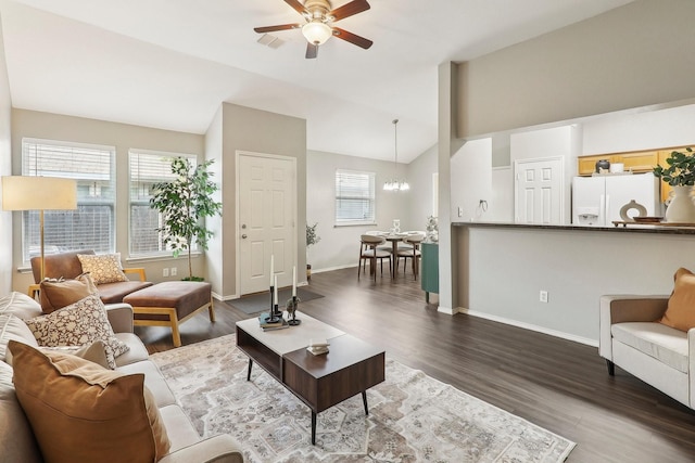 7243 Irish Valley Trl, Fort Worth, TX 76123 - living area featuring vaulted ceiling, a ceiling fan, dark wood-type flooring, and baseboards