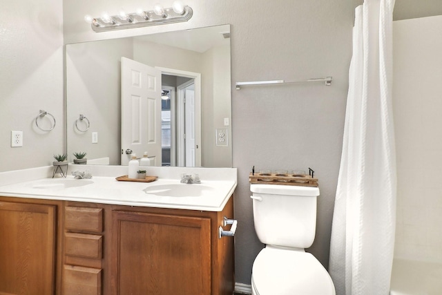 7243 Irish Valley Trl, Fort Worth, TX 76123 - bathroom featuring double vanity and toilet