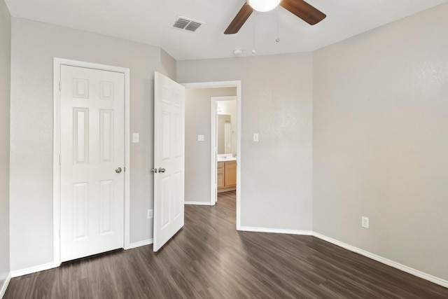 7243 Irish Valley Trl, Fort Worth, TX 76123 - unfurnished bedroom featuring dark wood-style flooring, baseboards, and a ceiling fan