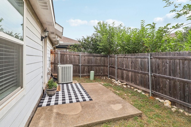 7243 Irish Valley Trl, Fort Worth, TX 76123 - fenced backyard with a patio area and cooling unit