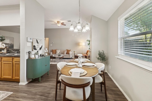 7243 Irish Valley Trl, Fort Worth, TX 76123 - dining room featuring dark wood-style flooring, vaulted ceiling, a ceiling fan, a chandelier, and baseboards