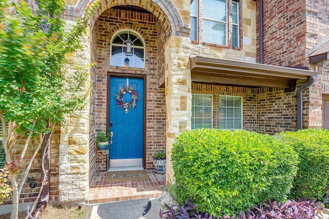 5040 Pallas Ct, Fort Worth, TX 76123 - doorway to property with brick siding and stone siding