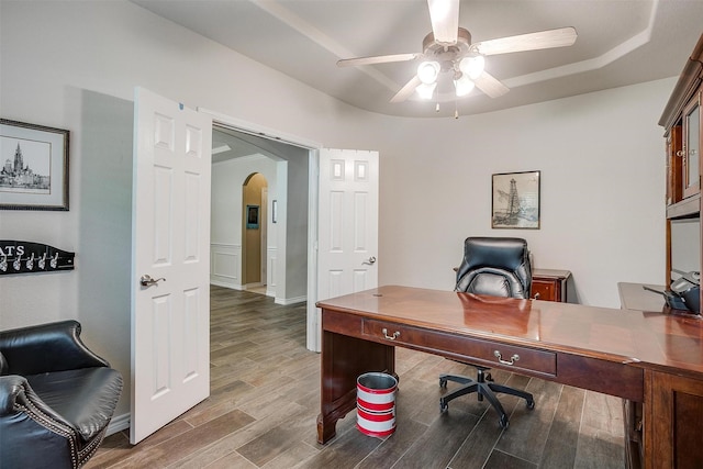 5040 Pallas Ct, Fort Worth, TX 76123 - office with arched walkways, a ceiling fan, and wood finished floors