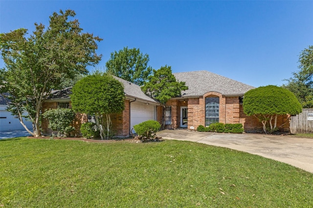 18609 Crownover Ct, Dallas, TX 75252 - view of front facade featuring a garage, brick siding, a front yard, and concrete driveway
