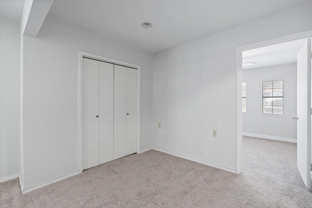 8222 Happy Trl, Alvarado, TX 76009 - unfurnished bedroom with carpet floors, a closet, and baseboards