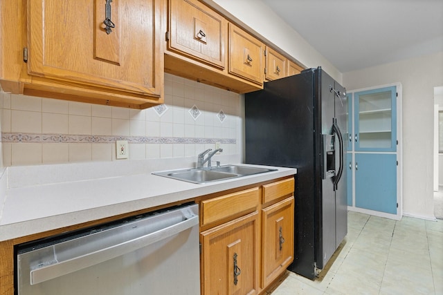 8222 Happy Trl, Alvarado, TX 76009 - kitchen with dishwasher, a sink, light countertops, backsplash, and brown cabinetry