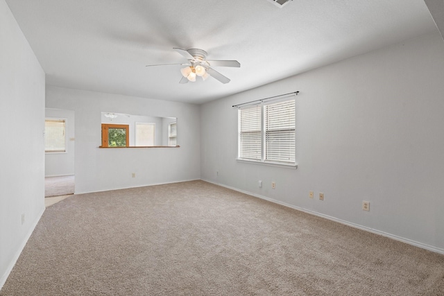 8222 Happy Trl, Alvarado, TX 76009 - carpeted spare room featuring a ceiling fan and baseboards