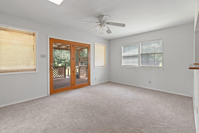 8222 Happy Trl, Alvarado, TX 76009 - carpeted empty room with healthy amount of natural light, ceiling fan, and baseboards