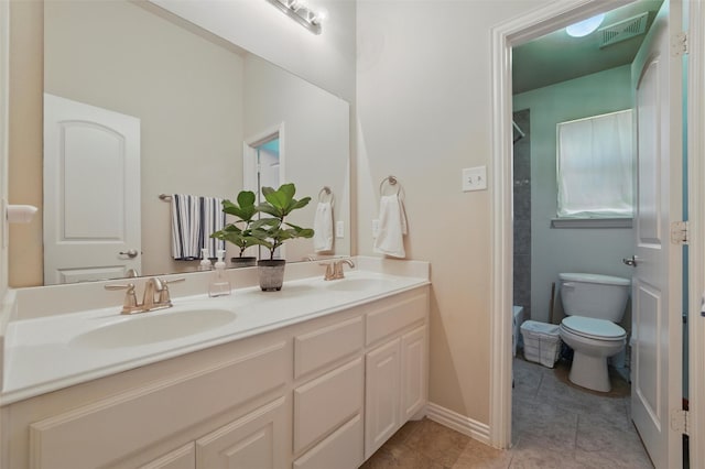 5142 Carlton Pkwy, Waxahachie, TX 75165 - bathroom featuring double vanity, toilet, tile patterned floors, and shower / bath combo with shower curtain