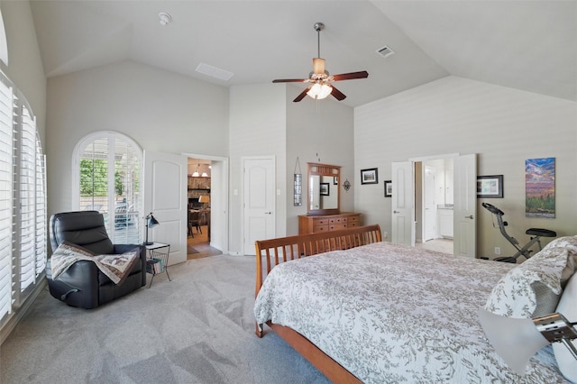 5142 Carlton Pkwy, Waxahachie, TX 75165 - bedroom with high vaulted ceiling, light carpet, ceiling fan, and ensuite bath