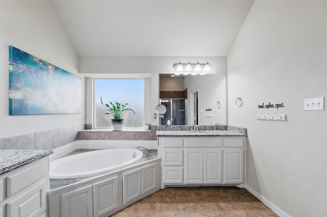 5142 Carlton Pkwy, Waxahachie, TX 75165 - full bathroom featuring vanity, a stall shower, a garden tub, lofted ceiling, and tile patterned floors