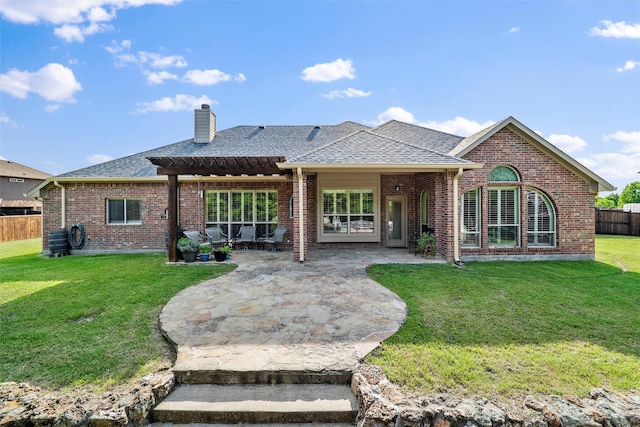5142 Carlton Pkwy, Waxahachie, TX 75165 - back of property featuring a pergola, a chimney, a patio area, and brick siding