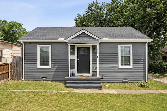 1215 Morrell Ave, Dallas, TX 75203 - bungalow-style home featuring roof with shingles and crawl space