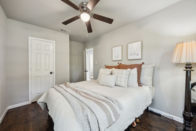 1215 Morrell Ave, Dallas, TX 75203 - bedroom featuring baseboards, wood finished floors, and a ceiling fan