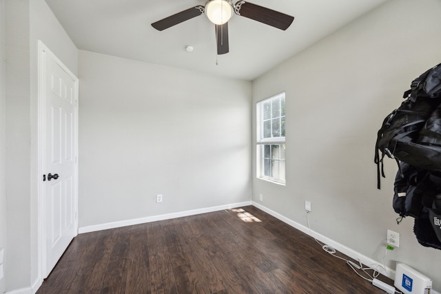 1215 Morrell Ave, Dallas, TX 75203 - unfurnished bedroom with wood finished floors, baseboards, and ceiling fan